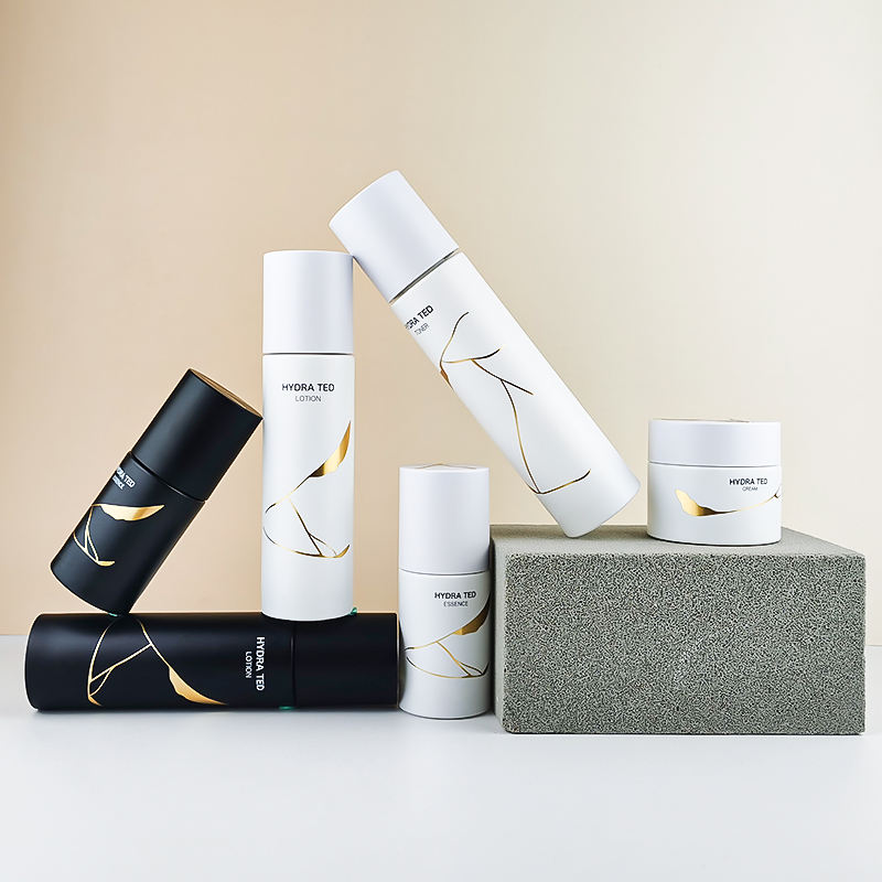 New Arrival Eco-friendly Cosmetic Glass Bottle Set White Black Gold Round Skin Care Lotion Pump Bottle and Jar
